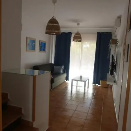 Casita En *